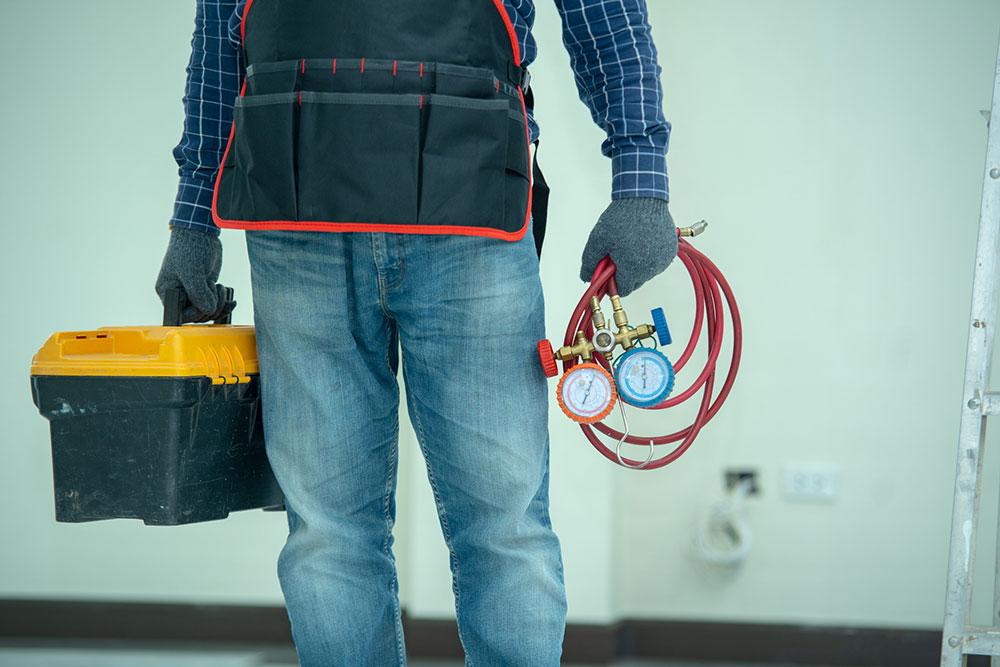 ac technician with tools